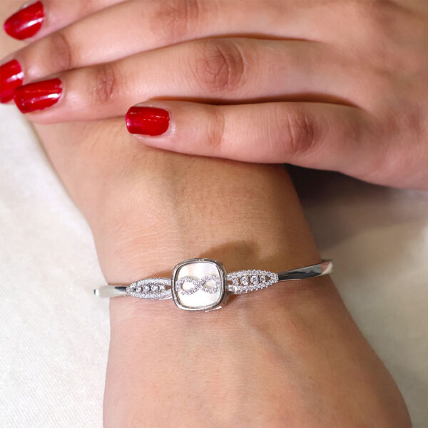 Infinity Glow Charm Bangle