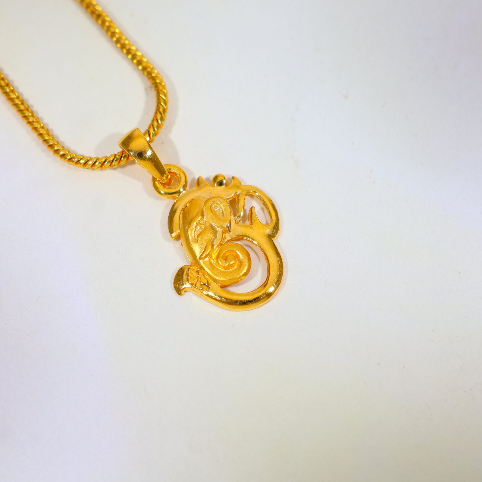 Divine Om Gold Pendant