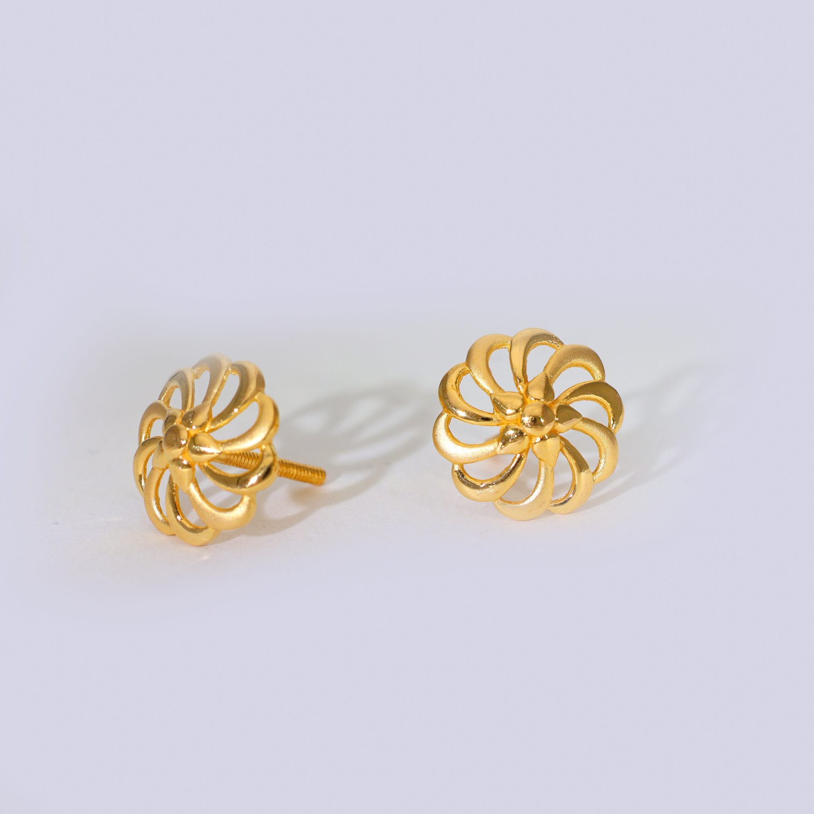 Floral Twist Gold Earrings - Image 3