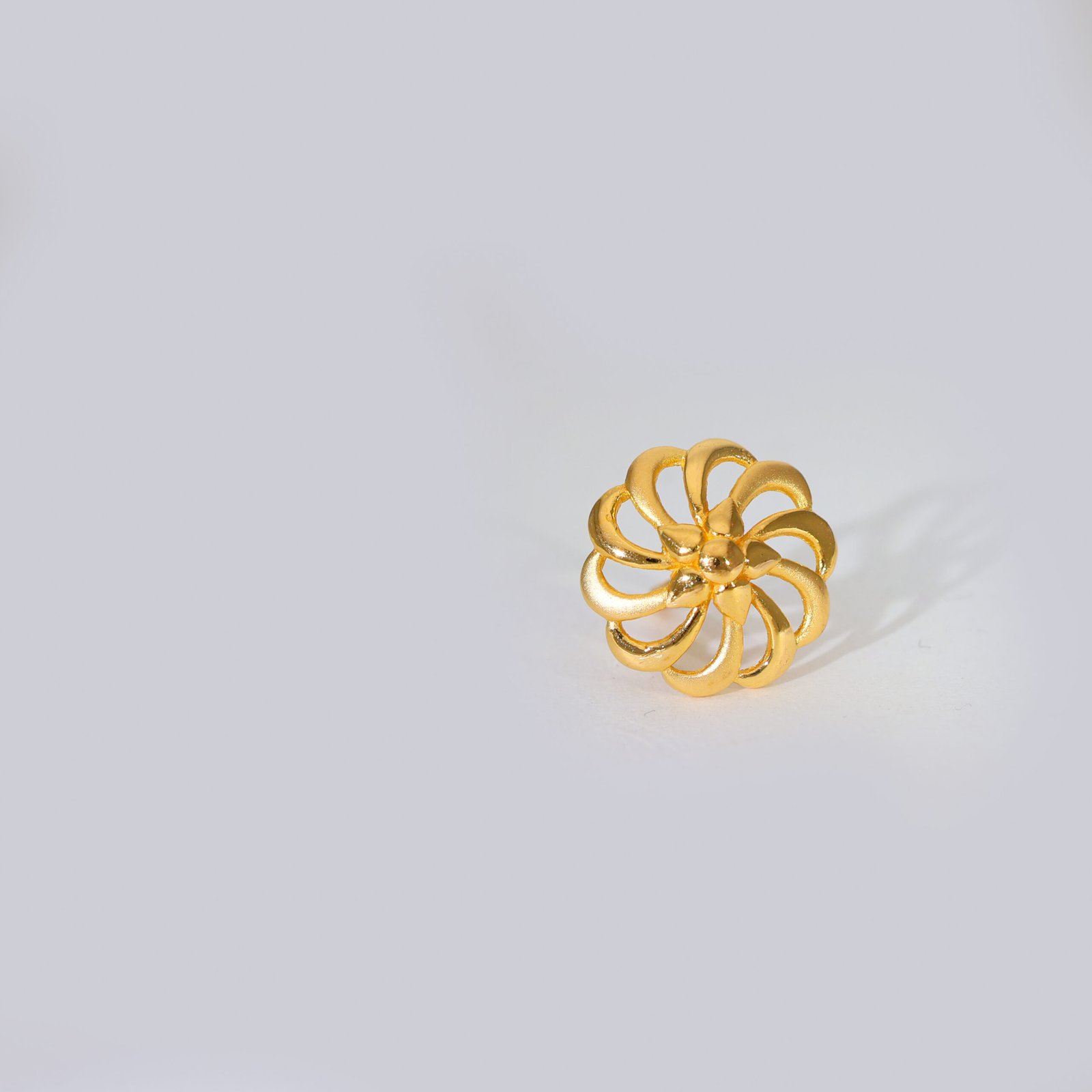 Floral Twist Gold Earrings - Image 2